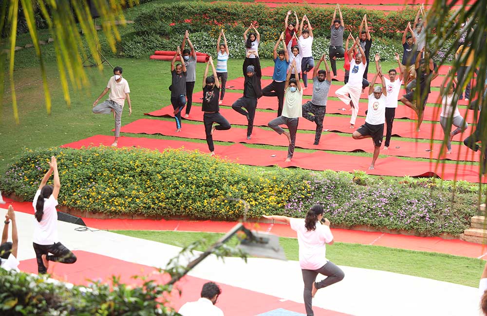 Students of IIMB participate in the 8th International Day of Yoga celebrations on campus on June 21, 2022.