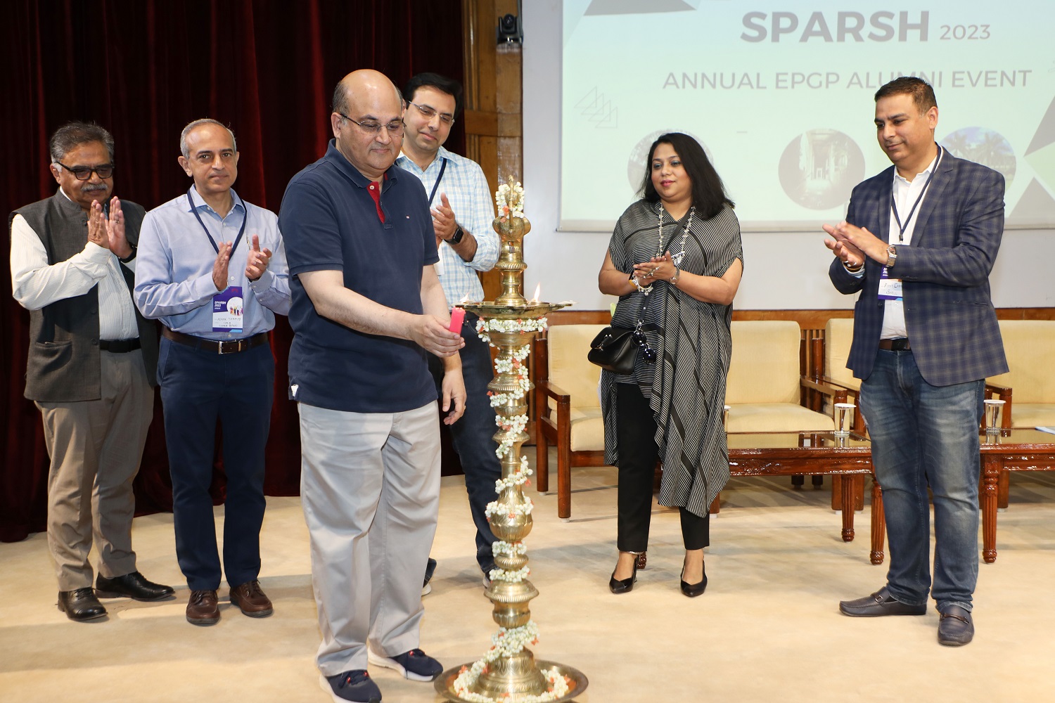 Prof. Rishikesha T Krishnan, Director, IIM Bangalore, inaugurates ‘Sparsh’, the annual EPGP alumni meet hosted by the Executive Post Graduate Programme in Management Office and the EPGP Student Alumni Committee, on 18th February 2023. Prof. Ashok Thampy, Chairperson, EPGP, and Prof. Abhoy K Ojha of the Organizational Behavior & Human Resources Management area, can also be seen.