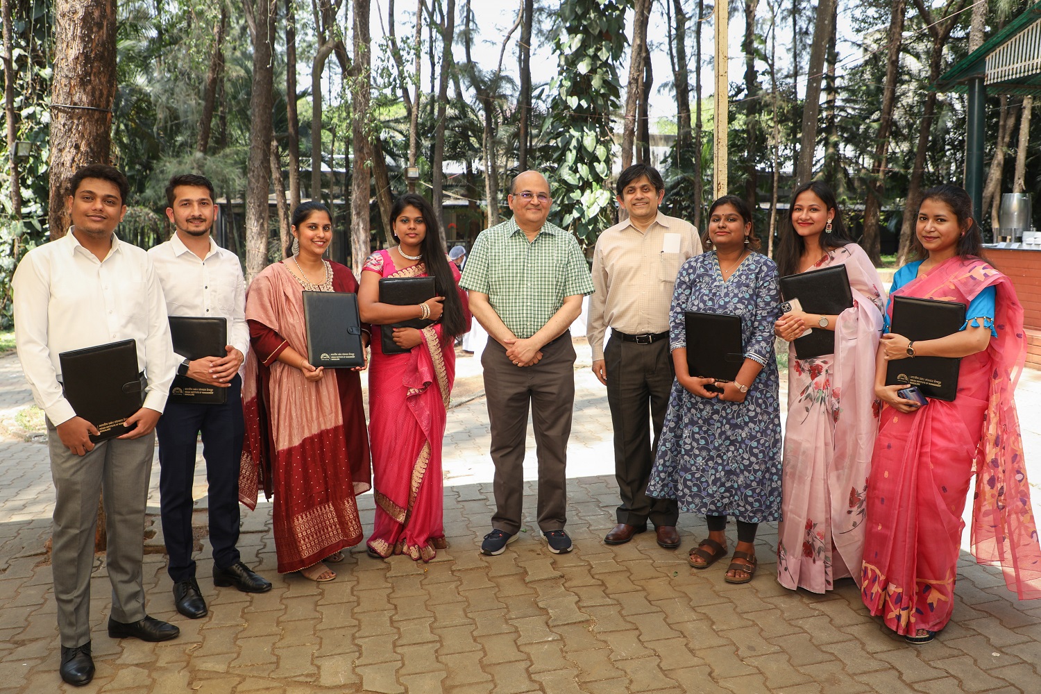 Prof. Rishikesha T Krishnan, Director, IIMB, and Prof. Anil B Suraj, Chairperson, N.S. Ramaswamy Pre-doctoral Programme, IIMB, with the Pre-doc students of 2022-23 at their farewell on 28th March 2023.