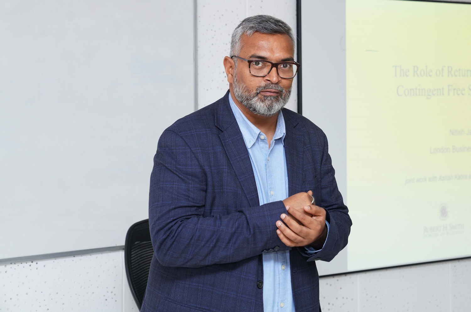 Prof. Nitish Jain, London Business School, at the research seminar on ‘The Role of Return Environment on Contingent Free Shipping Policies'. The seminar was organized by the Office of Research and Publications (R&P) at IIM Bangalore on 27th September 2024.